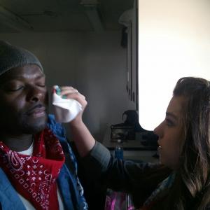 Pelligro (Calvin Williams) getting makeup on the set of #rumorsOfWars. It's gangster make up from from the new line of thug cosmetics.  with Hannah Grace now on Netflix