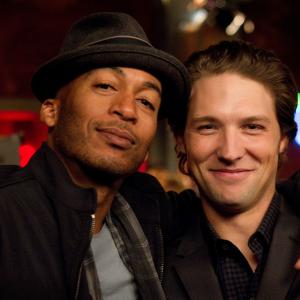 Still of James Lesure and Michael Cassidy in Men at Work (2012)