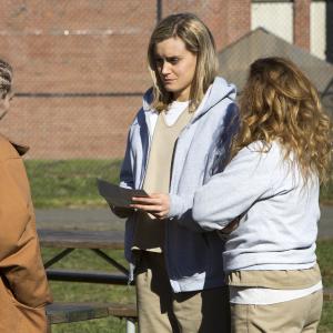 Still of Natasha Lyonne Taylor Schilling and Madeline Brewer in Orange Is the New Black 2013