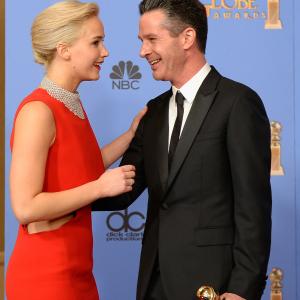 Simon Kinberg and Jennifer Lawrence at event of 73rd Golden Globe Awards (2016)