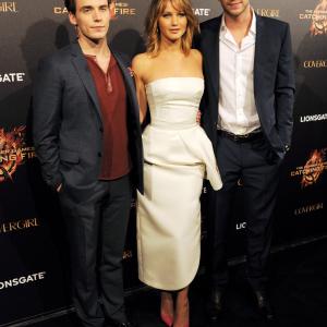 Jennifer Lawrence, Liam Hemsworth and Sam Claflin at event of Bado zaidynes. Ugnies medziokle (2013)