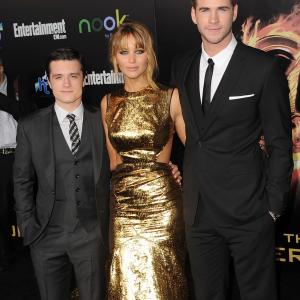 Josh Hutcherson, Jennifer Lawrence and Liam Hemsworth at event of Bado zaidynes (2012)