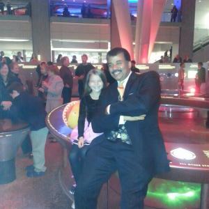 Accalia Quintana with Neil deGrasse Tyson at the Hayden Planetarium Dark Universe Premier