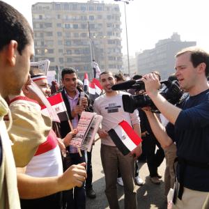 Director/Cinematographer Matthew O'Neill filming in Tahrir Square, Egypt. February 2011
