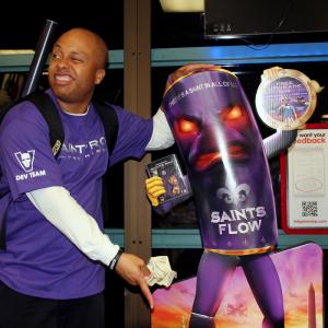 Arif LOVES the Fans especially all the 823482063rdStSaints8236 out there! Just ask Mid City LA GameStop employeesPictured below getting cozy with arch nemesis Paul the Saints Flow Can inside the GameStop Midnight re