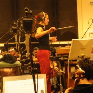 Rachel conducting the City of Prague Philharmonic for one of her film cues
