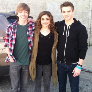 Zack Roosa and Sarah Hyland working together on Modern Family