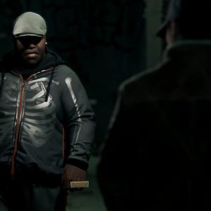 Bed Bug (R. Charles Wilkerson) meets up with Aiden Pearce (Noam Jenkins) in the video game, Watch Dogs.