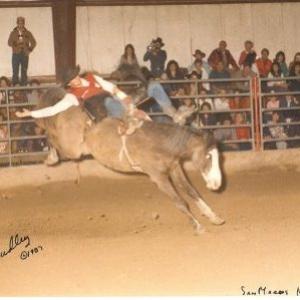 Glynn Praesel Bareback riding in San Marcos Rodeo