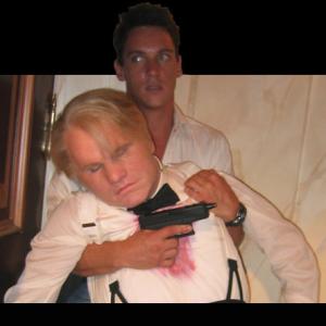 Jonathan Rhys Myers and a stunt double in a Philip Seymour Hoffman mask in Mission Impossible III
