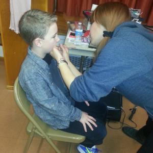 Justin getting make-up ready for filming Dirty Laundry.