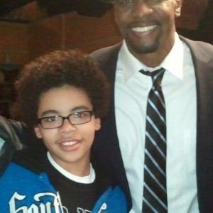 Devon with Terry Crews on the set of Are We There Yet?