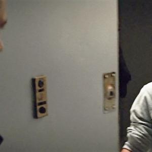 Devon OBrien greets Liam Neeson and Joel Kinnaman at the door in Run All Night