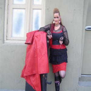 Short Film: The Smelly Janitor [ 2008 ] ~ http://www.imdb.com/title/tt1339565/ The Punk Rocker Chick waits outside a rehearsal studio for her, LATE AGAIN, Fellow Musicians.