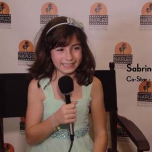 At the Naples Film Festival 2014 discussing her role as Young Gracie in Grace