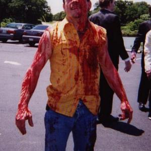 Mark E Howell as Billy Bob in Zombie Campout