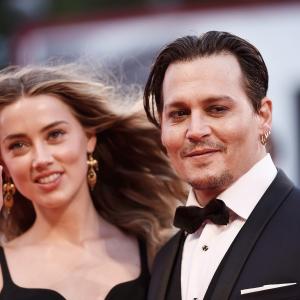 Johnny Depp and Amber Heard at event of Juodosios misios (2015)