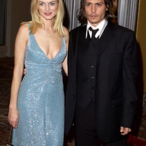 Johnny Depp and Heather Graham at event of From Hell (2001)