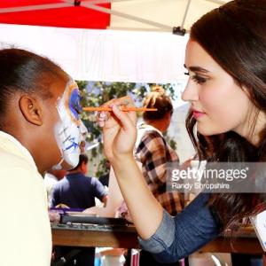 Lauren Franco serves at the Los Angeles Mission Summer Block Party 2015