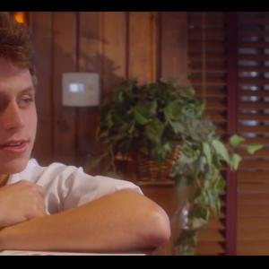 Michael Sherry as Justin in Separate Checks
