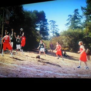 Me in the Fox Show  New Girl Episode is  Clavado En Un Bar Aired 1072014Im the one standing in the center of the frame watching the playersIm between the green jersey 33 and the red jersey player 14