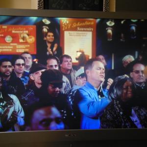 Me in the NBC Show  Parks and Recreation Episode is  Lil Sebastian Aired 5192011Im the one far right frame with the gold Beenie and the hoop earringsFellow Actor and Friend Paul Kent is sitting beside meHes wearing a blue Jacket