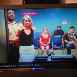 Me again in  Benched Episode is  Hooked  Booked Aired 11112014Im the one wearing the red dress sitting in the Waiting Area