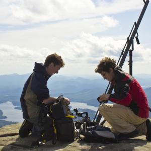 Blake Cortright left and Matthew Elton right set up a jib crane atop Whiteface Mountain in upstate NYs Adirondack park to capture footage for The 46ers documentary