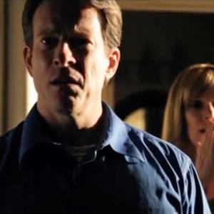 Chris Norden as the Father in LaserShield The Burglary Triple Play directed by Sean Pilcher 2011 crop In the background is Jackie Jones XI as the Mother