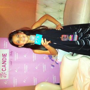 Bella Stine reporting at the gifting suite for the 2014 Kids Choice Awards for FTS Kids News.