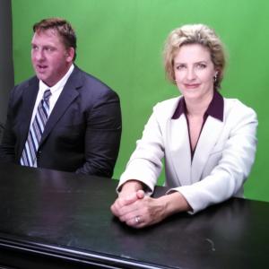 Stephanie Roede as a news anchor on the set of Forsaking All Others
