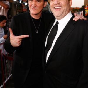 Quentin Tarantino and Harvey Weinstein at event of Negarbingi sunsnukiai (2009)