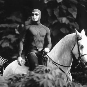 The Phantom (Billy Zane) roams thejungle on his dependable horse, Hero.