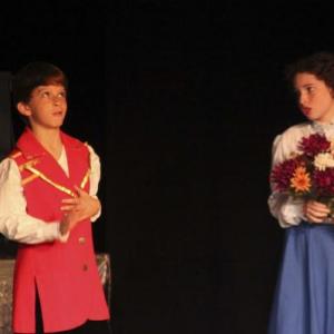 as Belle in Beauty and the Beast 2011