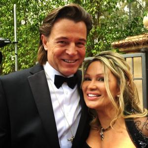 Brett Stimely with Lisa Christiansen at the Oscars 2015.