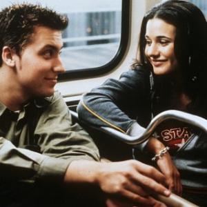 Still of Lance Bass and Emmanuelle Chriqui in On the Line (2001)
