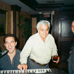 Arrive Alive 1990 Cast wrap party jamming on the keys with the late Johnny Oliver, music coordinator for the Paramount production.