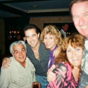 Arrive Alive 1990 wrap party Warren with the late Johnny Oliver and members of the crew.