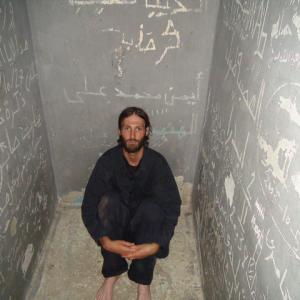 Matthew VanDyke in his prison cell in Tripoli Libya where he was held as a prisoner of war during part of the Libyan Civil War in 2011 before escaping from prison and returning to combat on the front lines