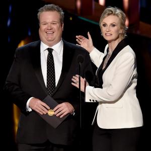 Jane Lynch and Eric Stonestreet at event of The 67th Primetime Emmy Awards (2015)