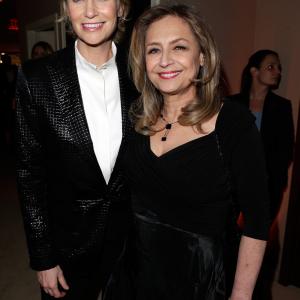 Jane Lynch (L) and Dr. Lara Embry attend the 2013 Vanity Fair Oscar Party hosted by Graydon Carter at Sunset Tower on February 24, 2013 in West Hollywood, California.