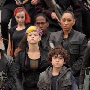 Still of Emma Elle Roberts, Rosa Salazar, Emjay Anthony, and Suki Waterhouse with the Dauntless Rebels for the film Insurgent.