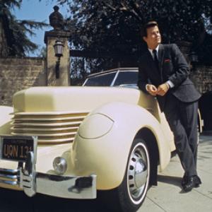 Dick Clark and his 1938 Cord 810 automobile circa 1970