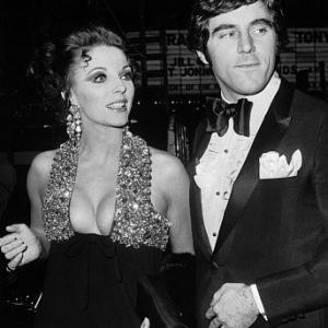 299-115 JOAN COLLINS AND HER HUSBAND, ANTHONY NEWLY, AT THE AMERICAN PREMIERE OF THE FILM, 