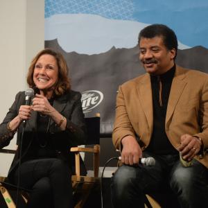 Ann Druyan and Neil deGrasse Tyson at event of Cosmos: A Spacetime Odyssey (2014)