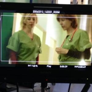 On the monitor on set with Sophie Lorain for her starring role in a new series called Au secours de Beatrice
