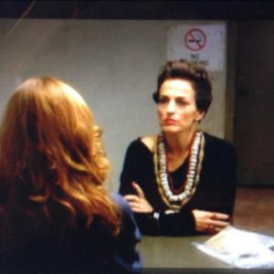 Me as Debra Messing in the interrogation room with Laz Alonso and the lovely lady you see in front of me