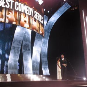 Shailyn Pierre-Dixon with actor Diego Klattenhoff presenting the award for Best Comedy Series at the Canadian Screen Awards