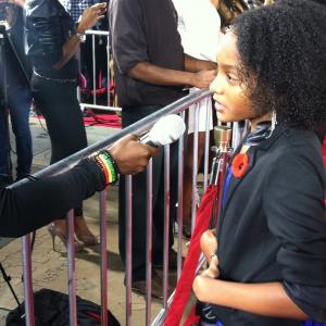 Shai PierreDixon interviewing on The Best Man Holiday Red Carpet Premiere Hollywood