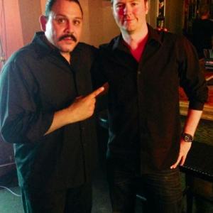Actor Emilio Rivera and producer David J Phillips on the set of 